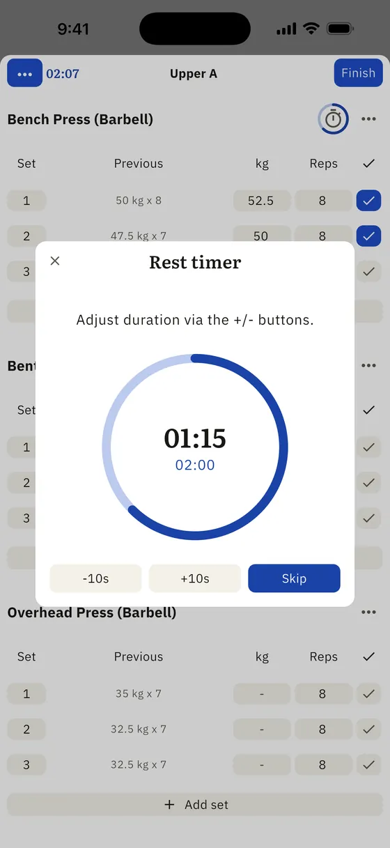 A rest timer counting down over a workout in progress, with buttons to add or remove ten seconds.